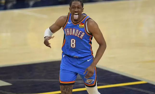 Oklahoma City Thunder forward Jalen Williams (8) motions after making a three pointer against the Indiana Pacers during the second half of Game 3 of the NBA Finals basketball series, Wednesday, June 11, 2025, in Indianapolis. (AP Photo/Abbie Parr)