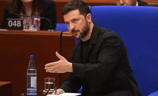 Ukraine's President Volodymyr Zelenskyy delivers a speech at the Council of Europe after signing the legal instruments necessary to launch the Special Tribunal for the Crime of Aggression against Ukraine, in Strasbourg, eastern France, Wednesday, June 25, 2025. (AP Photo/Pascal Bastien)
