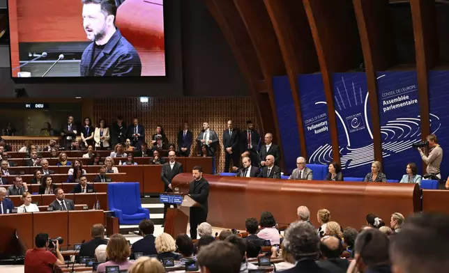 Ukraine's President Volodymyr Zelenskyy, delivers a speech at the Council of Europe after signing the legal instruments necessary to launch the Special Tribunal for the Crime of Aggression against Ukraine, in Strasbourg, eastern France, Wednesday, June 25, 2025. (AP Photo/Pascal Bastien)