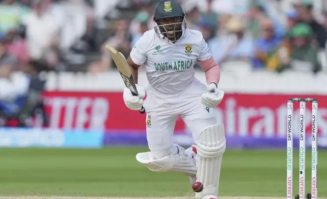 South Africa's captain Temba Bavuma reacts after playing a shot on day three of the World Test Championship final between South Africa and Australia at Lord's cricket ground in London, Friday, June 13, 2025. (AP Photo/Kirsty Wigglesworth)