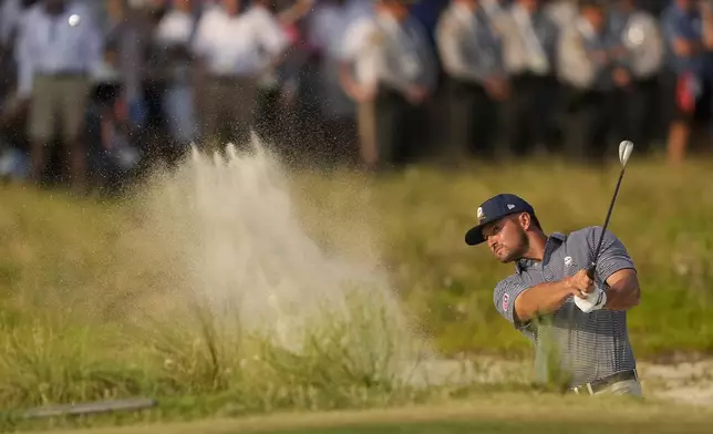 FILE - Bryson DeChambeau hits from the bunker on the 18th hole during the final round of the U.S. Open golf tournament Sunday, June 16, 2024, in Pinehurst, N.C. (AP Photo/Matt York, File)