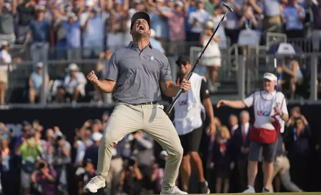 FILE - Bryson DeChambeau celebrates after winning the U.S. Open golf tournament Sunday, June 16, 2024, in Pinehurst, N.C. (AP Photo/Frank Franklin II, File)