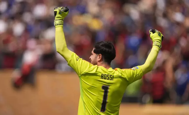 Flamengo's goalkeeper Agustin Rossi celebrates his team's second goal during the Club World Cup Group D soccer match between Flamengo and Chelsea in Philadelphia, Friday, June 20, 2025. (AP Photo/Chris Szagola)