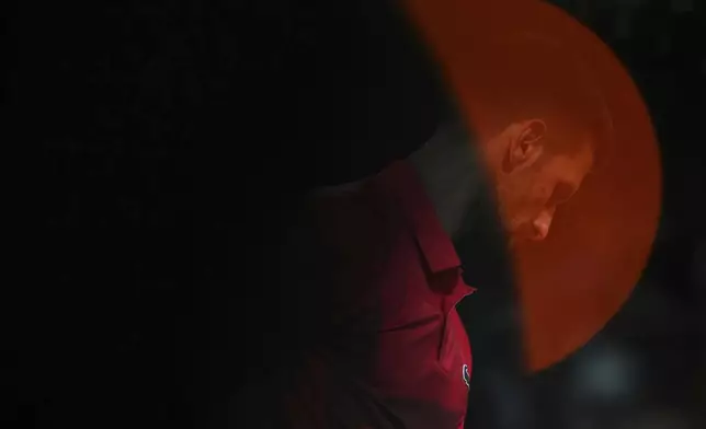 Serbia's Novak Djokovic prepares to serve against Germany's Alexander Zverev during their quarterfinal match of the French Tennis Open at the Roland-Garros stadium in Paris, Wednesday, June 4, 2025. (AP Photo/Lindsey Wasson)