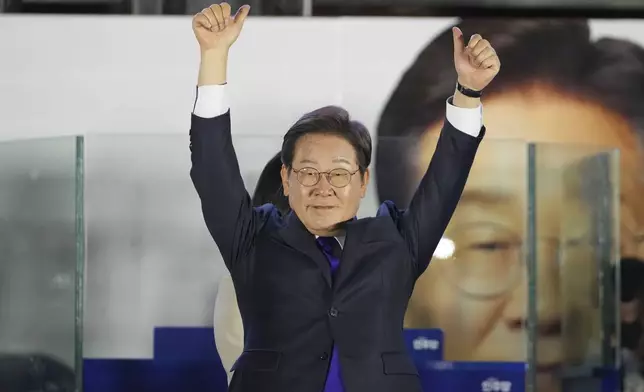 South Korea's Democratic Party's presidential candidate Lee Jae-myung, gestures as his supporters gather outside of the National Assembly in Seoul, South Korea, Wednesday, June 4, 2025. (AP Photo/Lee Jin-man)