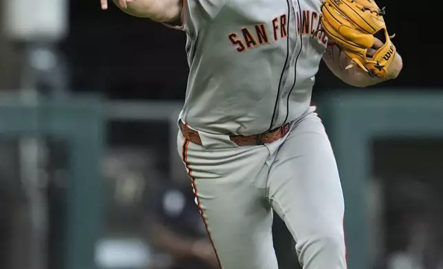 San Francisco Giants starting pitcher Landen Roupp throws out Chicago White Sox's Ryan Noda during the fourth inning of a baseball game Friday, June 27, 2025, in Chicago. (AP Photo/Erin Hooley)