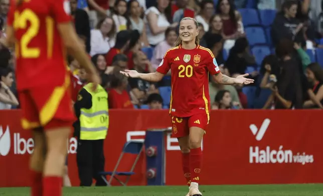 Spain's Claudia Pina celebrates after scoring her side's second goal during the women's Nations League soccer match between Spain and England at the RCD Espanyol Stadium, in Barcelona, Spain, Tuesday, June 3, 2025. (AP Photo/Joan Monfort)