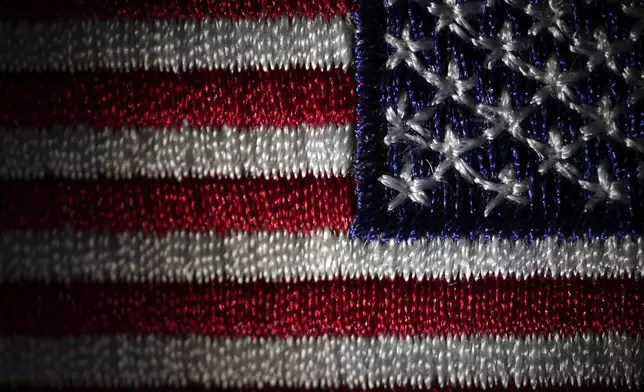 A morale patch embroidered with the United States flag is seen, Friday, June 6, 2025, in Marple Township, Pa. (AP Photo/Matt Slocum)
