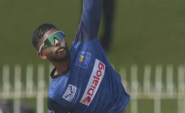 Sri Lanka's Sonal Dinusha warms up before the start of the first day of the second cricket test match between Sri Lanka and Bangladesh in Colombo, Sri Lanka, Wednesday, June 25, 2025. (AP Photo/Eranga Jayawardena)