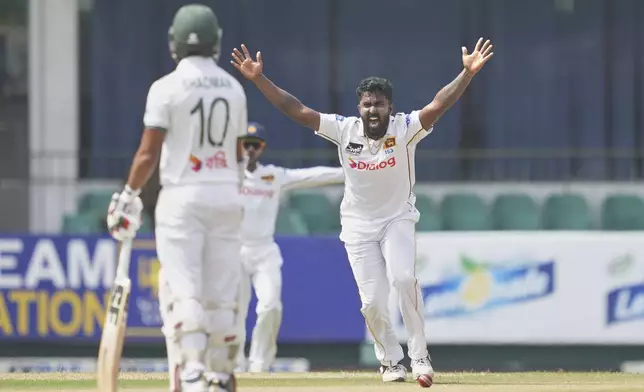 Sri Lanka's Asitha Fernando unsuccessfully appeals for the wicket of Bangladesh's Anamul Haque during the first day of the second cricket test match between Sri Lanka and Bangladesh in Colombo, Sri Lanka, Wednesday, June 25, 2025. (AP Photo/Eranga Jayawardena)