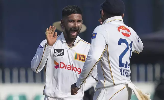 Sri Lanka's Sonal Dinusha celebrates the wicket of Bangladesh's Litton Das during the first day of the second cricket test match between Sri Lanka and Bangladesh in Colombo, Sri Lanka, Wednesday, June 25, 2025. (AP Photo/Eranga Jayawardena)