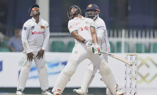 Bangladesh's captain Najmul Hossain Shanto reacts after playing a shot during the first day of the second cricket test match between Sri Lanka and Bangladesh in Colombo, Sri Lanka, Wednesday, June 25, 2025. (AP Photo/Eranga Jayawardena)