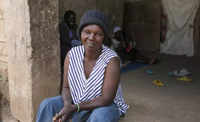 Aujene Cimanimpaye, from the Democratic Republic of Congo, poses for a photograph at the Kakuma Refugee Camp in Turkana County, Kenya, Wednesday, June 4, 2025. (AP Photo/Andrew Kasuku)