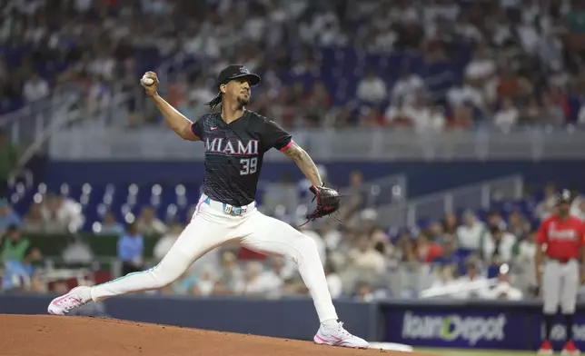 Miami Marlins starting pitcher Eury Pérez throws during the first inning of a baseball game against the Atlanta Braves, Saturday, June 21, 2025, in Miami. (AP Photo/Alexandra Rodriguez)