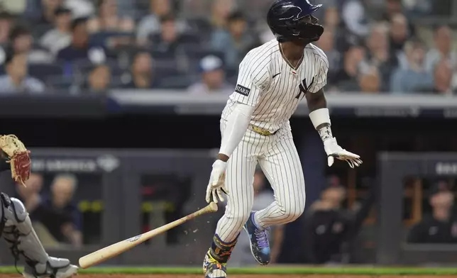 New York Yankees' Jazz Chisholm Jr. follows through on a single during the fifth inning of a baseball game against the Cleveland Guardians, Tuesday, June 3, 2025, in New York. (AP Photo/Frank Franklin II)
