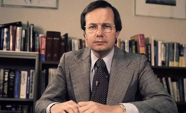 FILE - PBS host Bill Moyers appears at WNET in New York in 1974. (AP Photo, File)