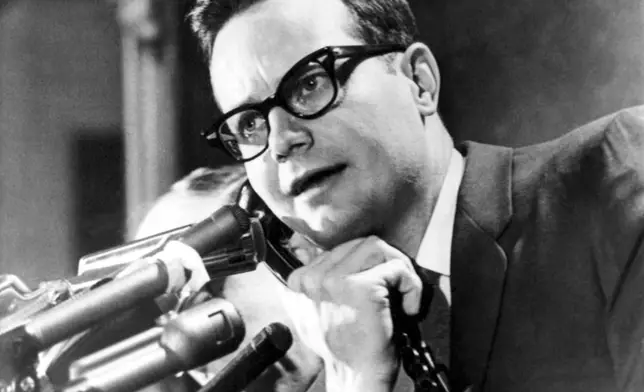FILE - White House press secretary Bill Moyers appears at a press briefing at White House in Washington on Feb. 25, 1966. (AP Photo/William J. Smith, File)