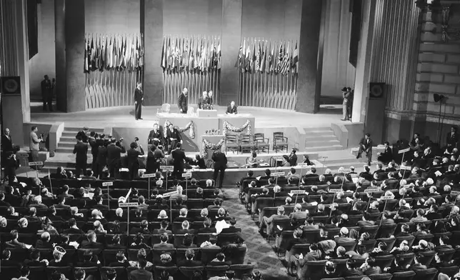 FILE - United Nations Conference delegates unanimously adopt the United Nations Charter in San Francisco, June 26, 1945. (AP Photo, File)