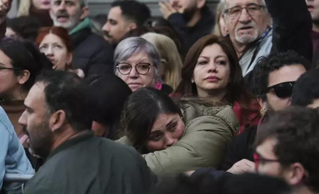 Supporters of former President Cristina Fernandez react after Argentina's Supreme Court upheld her corruption conviction, outside the Peronist Party headquarters in Buenos Aires, Argentina, Tuesday, June 10, 2025. (AP Photo/Rodrigo Abd)