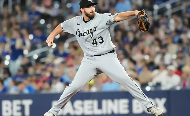 Chicago White Sox pitcher Aaron Civale (43) works against Toronto Blue Jays during the first inning of a baseball game, Saturday June 21, 2025, in Toronto. (Chris Young/The Canadian Press via AP)