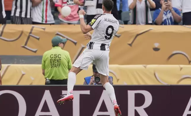 Juventus' Dusan Vlahovic reacts after scoring from a penalty kick during the Club World Cup Group G soccer match between Juventus and Wydad AC in Philadelphia, Sunday, June 22, 2025. (AP Photo/Chris Szagola)