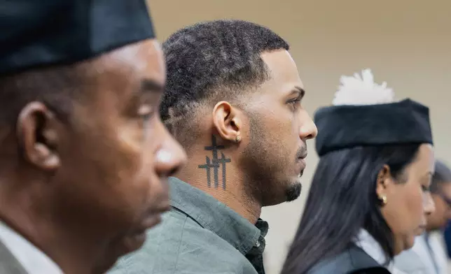Tampa Bay Rays shortstop Wander Franco, center, reacts after hearing his sentence during his trial on charges of sexual abuse of a minor, alongside his lawyers Teodosio Jaquez, left, and Irina Ventura in Puerto Plata, Dominican Republic, Thursday, June 26, 2025. (AP Photo/Fran Afonso)