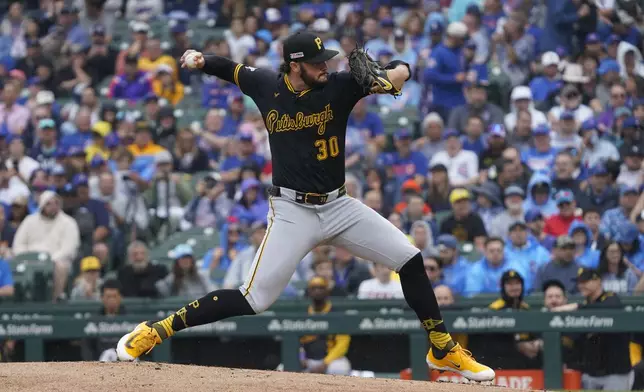 Pittsburgh Pirates pitcher Paul Skenes (30) throws during the first inning of a baseball game against the Chicago Cubs, Friday, June 13, 2025, in Chicago. (AP Photo/David Banks)