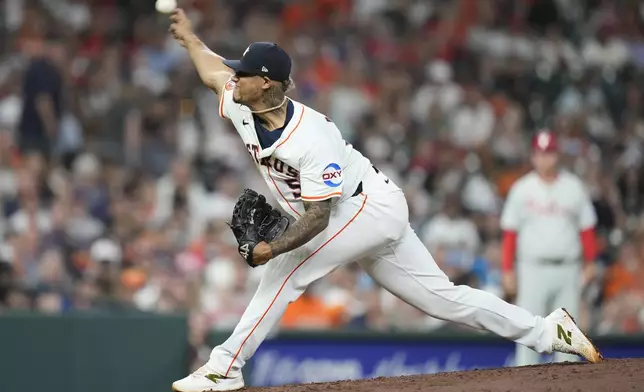 Houston Astros relief pitcher Bryan Abreu pitches to Philadelphia Phillies' Trea Turner during the eighth inning of a baseball game, Thursday, June 26, 2025, in Houston. (AP Photo/Karen Warren)
