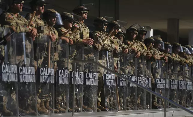 California National Guard guard the Federal Building on Tuesday, June 10, 2025, in downtown Los Angeles. (AP Photo/Eric Thayer)