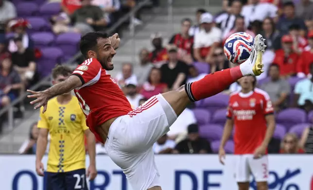 Benfica's Vangelis Pavlidis controls the ball during the Club World Cup Group C soccer match between Benfica and Auckland City in Orlando, Fla., Friday, June 20, 2025. (AP Photo/Phelan Ebenhack)