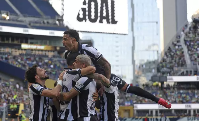 Botafogo celebrates after Jair Cunha scored the opening goal during the Club World Cup group B soccer match between Botafogo and Seattle Sounders at Seattle Lumen Field, in Seattle, Sunday, June 15, 2025. (AP Photo/Ryan Sun)