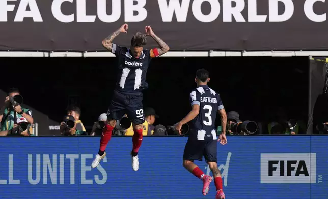 Monterrey's Sergio Ramos, left, celebrates with Gerardo Arteaga after scoring the opening goal during the Club World Cup group E soccer match between CF Monterrey and Inter Milan in Pasadena, Calif., Tuesday, June 17, 2025. (AP Photo/Mark J. Terrill)