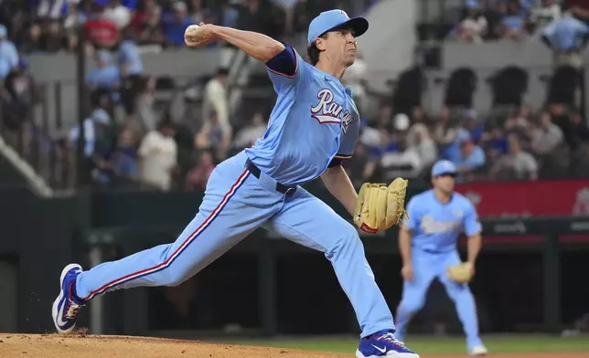 Texas Rangers starting pitcher Jacob deGrom throws during the first inning of a baseball game against the St. Louis Cardinals, Sunday, June 1, 2025, in Arlington, Texas. (AP Photo/LM Otero)