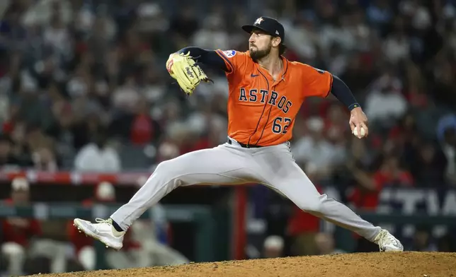 Houston Astros pitcher Bennett Sousa delivers a pitch during the 10th inning of a baseball game against the Los Angeles Angels, Friday, June 20, 2025, in Anaheim, Calif. (AP Photo/William Liang)