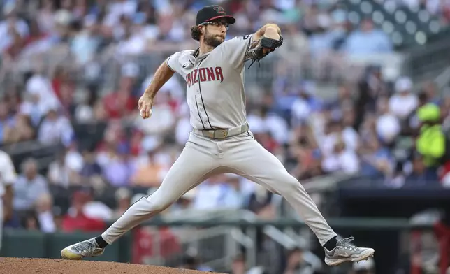 Arizona Diamondbacks pitcher Zac Gallen delivers in the second inning of a baseball game against the Atlanta Braves, Tuesday, June 3, 2025, in Atlanta. (AP Photo/Colin Hubbard)