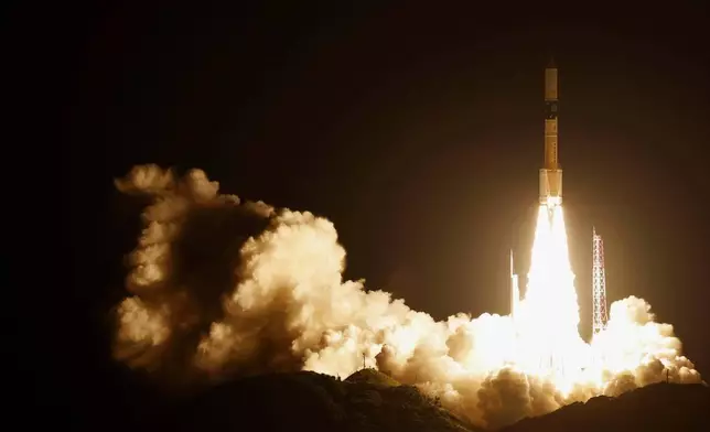 An H-2A rocket carrying Global Observing SATellite for Greenhouse gases and Water cycle, or GOSAT-GW satellite, lifts off from a launch pad in Tanegashima Space Center in Tanegashima, southern Japan, early Sunday, June 29, 2025. (Haruna Furuhashi/Kyodo News via AP)