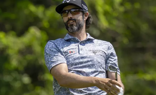 Canada's Adam Hadwin watches his tee shot on the 11th hole during the third round of the Canadian Open golf tournament in Caledon, Ontario, Saturday, June 7, 2025. (Frank Gunn/The Canadian Press via AP)