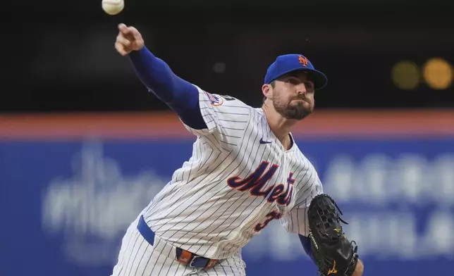 New York Mets' Clay Holmes pitches during the second inning of a baseball game against the Atlanta Braves Wednesday, June 25, 2025, in New York. (AP Photo/Frank Franklin II)