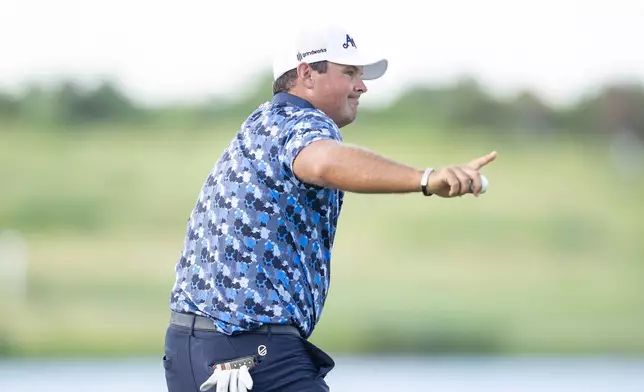 Patrick Reed, of 4Aces GC, reacts after his putt on the 18th green during the final round of LIV Golf Dallas at Maridoe Golf Club, Sunday, June 29, 2025, in Carrollton, Texas. (Mateo Villalba/LIV Golf via AP)