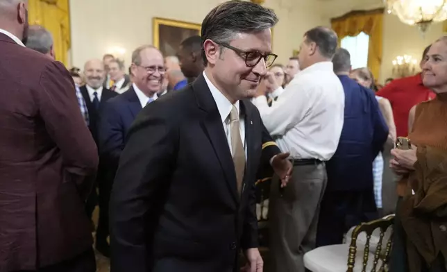 House Speaker Mike Johnson, R-La., departs an event to promote President Donald Trump's domestic policy and budget agenda in the East Room of the White House, Thursday, June 26, 2025, in Washington. (AP Photo/Mark Schiefelbein)