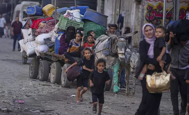 Displaced Palestinians flee Jabalia after the Israeli army issued evacuation orders in Gaza City, June 29, 2025. (AP Photo/Jehad Alshrafi)