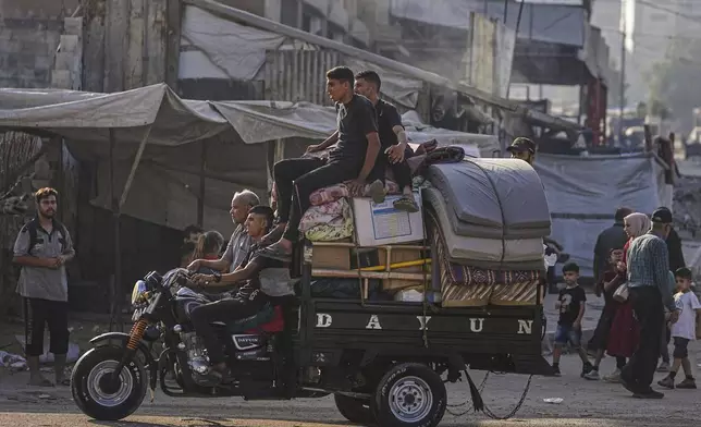 Displaced Palestinians flee Jabalia after the Israeli army issued evacuation orders in Gaza City, June 29, 2025. (AP Photo/Jehad Alshrafi)
