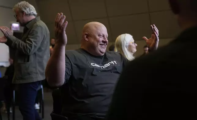 San Jose Police Department Capt. Stephen Donohue participates in an improvisational exercise lead by The Second City instructors during a University of Chicago Crime Lab class that is part of the Policing Leadership Academy program, on April 11, 2025, in Chicago. (AP Photo/Erin Hooley)