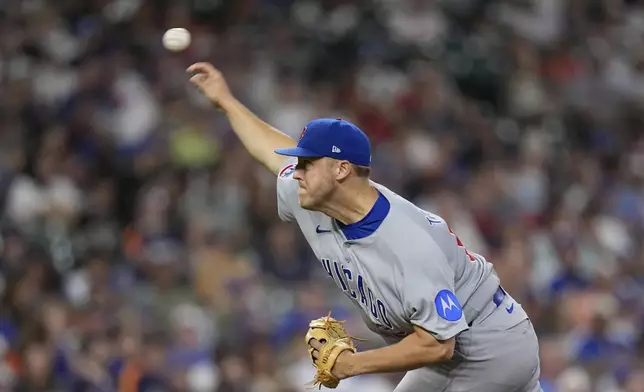 Chicago Cubs starting pitcher Jameson Taillon throws against the Houston Astros during the first inning of a baseball game Sunday, June 29, 2025, in Houston. (AP Photo/David J. Phillip)