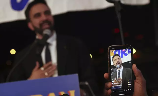 Democratic mayoral candidate Zohran Mamdani is recorded by supporters while he speaks at his primary election party, Wednesday, June 25, 2025, in New York. (AP Photo/Heather Khalifa)