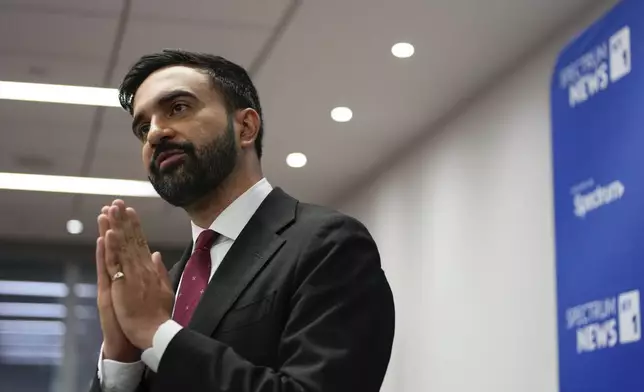 Assemblyman Zohran Mamdani talks to people after the New York City Democratic Mayoral Primary Debate at the John Jay College of Criminal Justice in the Gerald W. Lynch Theater on Thursday, June 12, 2025 in New York City. (Vincent Alban/The New York Times via AP, Pool)