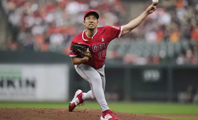 Los Angeles Angels starting pitcher Yusei Kikuchi delivers during the first inning of a baseball game against the Baltimore Orioles, Sunday, June 15, 2025, in Baltimore. (AP Photo/Stephanie Scarbrough)