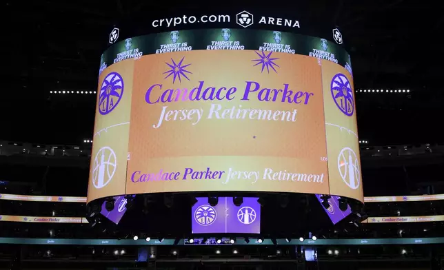 A general view of the Jumbotron is seen with Candace Parker jersey retirement signage prior to a WNBA basketball game between the Los Angeles Sparks and the Chicago Sky, Sunday, June 29, 2025, in Los Angeles. (AP Photo/Jessie Alcheh)