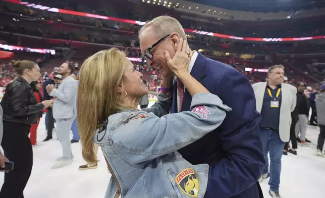 Florida Panthers head coach Paul Maurice and his wife Michelle celebrate after winning the Stanley Cup in Game 6 of the NHL hockey Stanley Cup Final against the Edmonton Oilers Tuesday, June 17, 2025, in Sunrise, Fla. (AP Photo/Lynne Sladky)