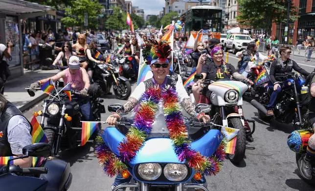 People ride motorcycles during the World Pride parade, Saturday, June 7, 2025, in Washington. (AP Photo/Julia Demaree Nikhinson)